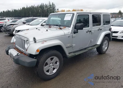 2011 Jeep Wrangler Unlimited Sahara из США, поврежденный, VIN 1J4BA5H14BL521928